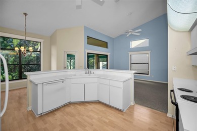 IN TIMBER GREENS A 55+ GATED GOLF COMMUNITY... This 2-bedroom 2 on Timber Greens Country Club in Florida - for sale on GolfHomes.com, golf home, golf lot