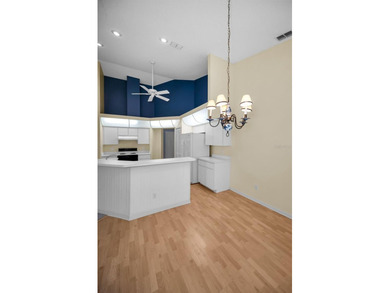 IN TIMBER GREENS A 55+ GATED GOLF COMMUNITY... This 2-bedroom 2 on Timber Greens Country Club in Florida - for sale on GolfHomes.com, golf home, golf lot