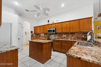 Discover the potential of this charming 3 bed, 3 bath pool home on The Grand Club Cypress Course in Florida - for sale on GolfHomes.com, golf home, golf lot