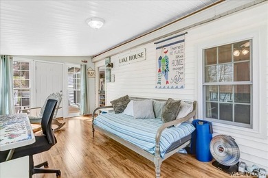 Effortless lakefront living meets income potential--welcome to on Tanglewood Shores Golf Club in Virginia - for sale on GolfHomes.com, golf home, golf lot