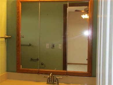 Upon entering this well maintained home you are immediately on Holiday Island Golf Course in Arkansas - for sale on GolfHomes.com, golf home, golf lot