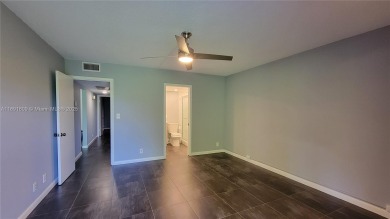 Beautifully remodeled condo in the sought-after Granada Village on Wynmoor Golf Course in Florida - for sale on GolfHomes.com, golf home, golf lot