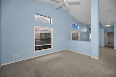 IN TIMBER GREENS A 55+ GATED GOLF COMMUNITY... This 2-bedroom 2 on Timber Greens Country Club in Florida - for sale on GolfHomes.com, golf home, golf lot