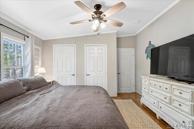 Effortless lakefront living meets income potential--welcome to on Tanglewood Shores Golf Club in Virginia - for sale on GolfHomes.com, golf home, golf lot