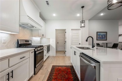 Built in 2024, this home sits on .29 acre lot minutes from I49 on Bella Vista Country Club - Highlands in Arkansas - for sale on GolfHomes.com, golf home, golf lot