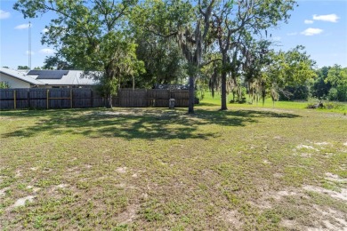 One or more photo(s) has been virtually staged. SPACIOUS FAMILY on Williston Highlands Golf and Country Club in Florida - for sale on GolfHomes.com, golf home, golf lot