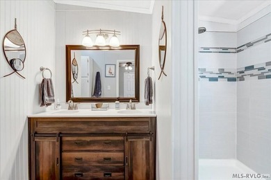 Effortless lakefront living meets income potential--welcome to on Tanglewood Shores Golf Club in Virginia - for sale on GolfHomes.com, golf home, golf lot