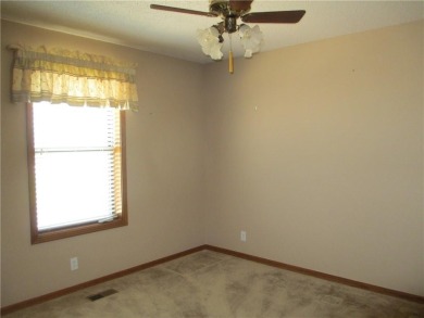 Upon entering this well maintained home you are immediately on Holiday Island Golf Course in Arkansas - for sale on GolfHomes.com, golf home, golf lot