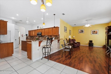 Discover the potential of this charming 3 bed, 3 bath pool home on The Grand Club Cypress Course in Florida - for sale on GolfHomes.com, golf home, golf lot