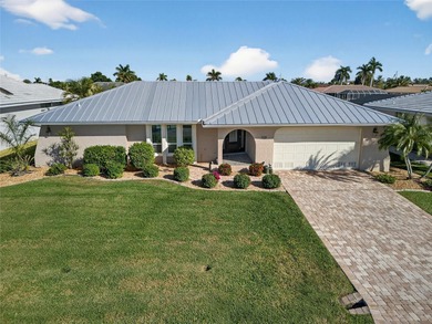 PUNTA GORDA ISLES!! IMMACULATE 3 BEDROOM, 2 BATH, 2-CAR GARAGE on Saint Andrews South Golf Club in Florida - for sale on GolfHomes.com, golf home, golf lot