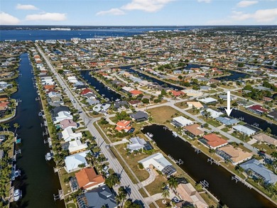 PUNTA GORDA ISLES!! IMMACULATE 3 BEDROOM, 2 BATH, 2-CAR GARAGE on Saint Andrews South Golf Club in Florida - for sale on GolfHomes.com, golf home, golf lot