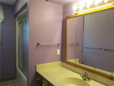Upon entering this well maintained home you are immediately on Holiday Island Golf Course in Arkansas - for sale on GolfHomes.com, golf home, golf lot