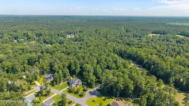 This 1.88 acre cul-de-sac lot backs up to the 12th fairway in on Carolina Colours Golf Club in North Carolina - for sale on GolfHomes.com, golf home, golf lot