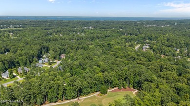 This 1.88 acre cul-de-sac lot backs up to the 12th fairway in on Carolina Colours Golf Club in North Carolina - for sale on GolfHomes.com, golf home, golf lot