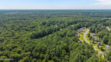 This 1.88 acre cul-de-sac lot backs up to the 12th fairway in on Carolina Colours Golf Club in North Carolina - for sale on GolfHomes.com, golf home, golf lot