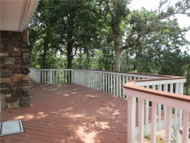 Upon entering this well maintained home you are immediately on Holiday Island Golf Course in Arkansas - for sale on GolfHomes.com, golf home, golf lot