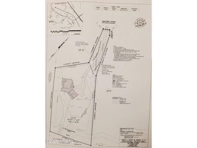 This 1.88 acre cul-de-sac lot backs up to the 12th fairway in on Carolina Colours Golf Club in North Carolina - for sale on GolfHomes.com, golf home, golf lot