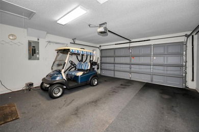 IN TIMBER GREENS A 55+ GATED GOLF COMMUNITY... This 2-bedroom 2 on Timber Greens Country Club in Florida - for sale on GolfHomes.com, golf home, golf lot