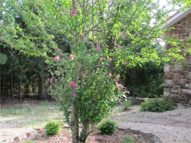 Upon entering this well maintained home you are immediately on Holiday Island Golf Course in Arkansas - for sale on GolfHomes.com, golf home, golf lot