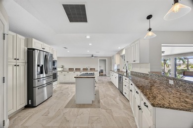 PUNTA GORDA ISLES!! IMMACULATE 3 BEDROOM, 2 BATH, 2-CAR GARAGE on Saint Andrews South Golf Club in Florida - for sale on GolfHomes.com, golf home, golf lot