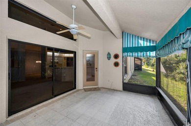 IN TIMBER GREENS A 55+ GATED GOLF COMMUNITY... This 2-bedroom 2 on Timber Greens Country Club in Florida - for sale on GolfHomes.com, golf home, golf lot