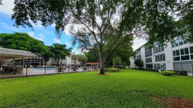 Beautifully remodeled condo in the sought-after Granada Village on Wynmoor Golf Course in Florida - for sale on GolfHomes.com, golf home, golf lot