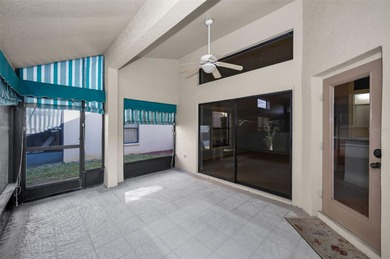 IN TIMBER GREENS A 55+ GATED GOLF COMMUNITY... This 2-bedroom 2 on Timber Greens Country Club in Florida - for sale on GolfHomes.com, golf home, golf lot