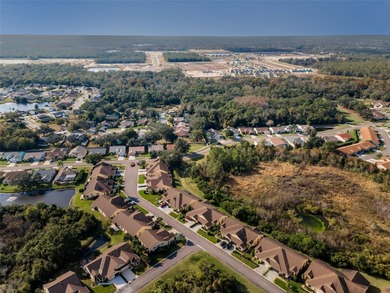 IN TIMBER GREENS A 55+ GATED GOLF COMMUNITY... This 2-bedroom 2 on Timber Greens Country Club in Florida - for sale on GolfHomes.com, golf home, golf lot