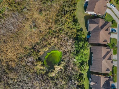 IN TIMBER GREENS A 55+ GATED GOLF COMMUNITY... This 2-bedroom 2 on Timber Greens Country Club in Florida - for sale on GolfHomes.com, golf home, golf lot