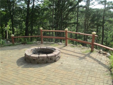Upon entering this well maintained home you are immediately on Holiday Island Golf Course in Arkansas - for sale on GolfHomes.com, golf home, golf lot