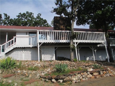Upon entering this well maintained home you are immediately on Holiday Island Golf Course in Arkansas - for sale on GolfHomes.com, golf home, golf lot