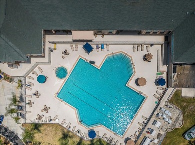 IN TIMBER GREENS A 55+ GATED GOLF COMMUNITY... This 2-bedroom 2 on Timber Greens Country Club in Florida - for sale on GolfHomes.com, golf home, golf lot