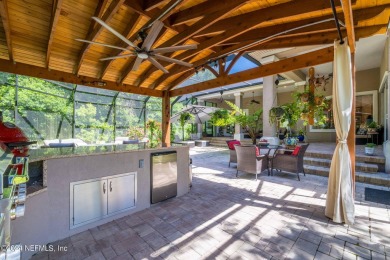 Experience luxury outdoor living amidst natural beauty in this on The Palencia Club in Florida - for sale on GolfHomes.com, golf home, golf lot