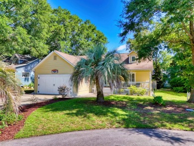 Nestled on a quiet cul-de-sac in The Bluffs at Pawleys Island on Pawleys Plantation Golf and Country Club in South Carolina - for sale on GolfHomes.com, golf home, golf lot