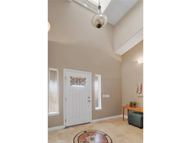 Step into this beautifully maintained 3-bedroom, 2-bathroom home on Silver Lakes Golf Course in California - for sale on GolfHomes.com, golf home, golf lot