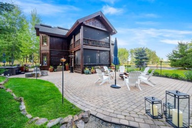 Nestled in natural beauty, this updated lodge-style estate home on Osprey Meadows at Tamarack Resort in Idaho - for sale on GolfHomes.com, golf home, golf lot