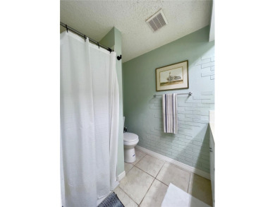 Looking for peace, privacy, and CHARM? This 2-bedroom on Beacon Woods Golf Club in Florida - for sale on GolfHomes.com, golf home, golf lot