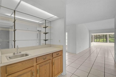 Short Sale. Step into a high-value opportunity in the on IMG Academies Golf and Country Club in Florida - for sale on GolfHomes.com, golf home, golf lot