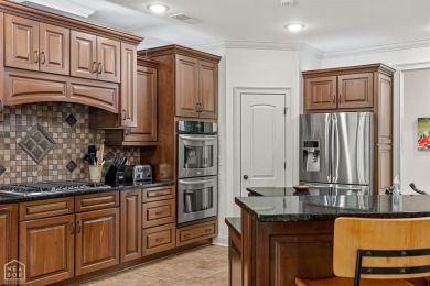Welcome to the epitome of luxury living in the prestigious on RidgePointe Country Club in Arkansas - for sale on GolfHomes.com, golf home, golf lot
