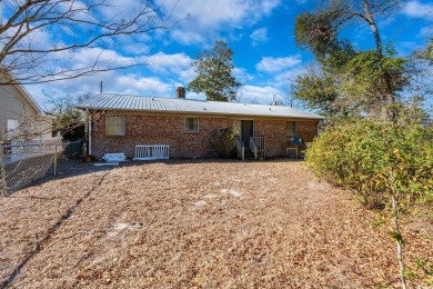 **NO HOA--GOLF CART TO BEACH** Welcome to this charming beach on Possum Trot Golf Course in South Carolina - for sale on GolfHomes.com, golf home, golf lot