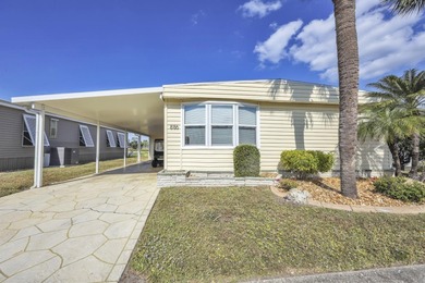 Discover comfort, style, and scenic golf course living in this on Maple Leaf Golf and Country Club in Florida - for sale on GolfHomes.com, golf home, golf lot