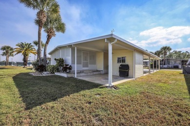 Discover comfort, style, and scenic golf course living in this on Maple Leaf Golf and Country Club in Florida - for sale on GolfHomes.com, golf home, golf lot