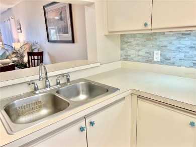 Gorgeously remodeled, turnkey-furnished corner condo with on Tara Golf and Country Club in Florida - for sale on GolfHomes.com, golf home, golf lot
