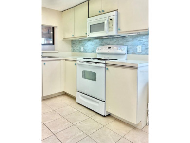 Gorgeously remodeled, turnkey-furnished corner condo with on Tara Golf and Country Club in Florida - for sale on GolfHomes.com, golf home, golf lot