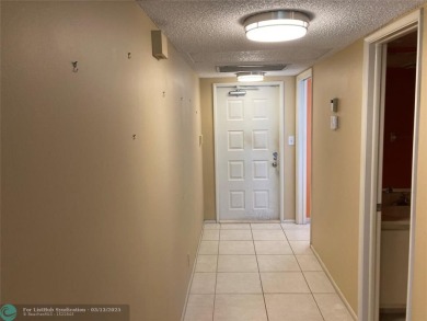 Opportunity knocks with this spacious F unit in Palm Aire on Oaks Country Club in Florida - for sale on GolfHomes.com, golf home, golf lot