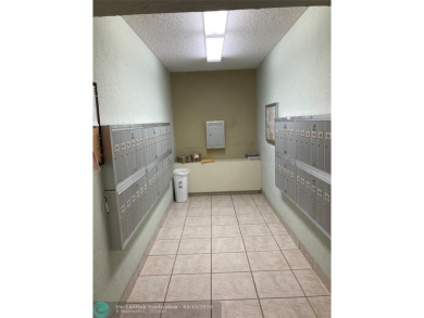 Opportunity knocks with this spacious F unit in Palm Aire on Oaks Country Club in Florida - for sale on GolfHomes.com, golf home, golf lot