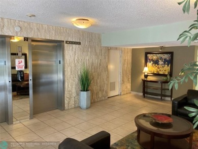 Opportunity knocks with this spacious F unit in Palm Aire on Oaks Country Club in Florida - for sale on GolfHomes.com, golf home, golf lot