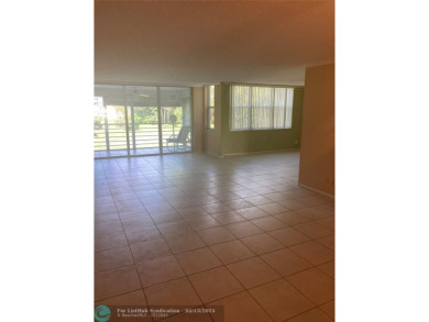 Opportunity knocks with this spacious F unit in Palm Aire on Oaks Country Club in Florida - for sale on GolfHomes.com, golf home, golf lot