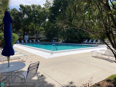 Opportunity knocks with this spacious F unit in Palm Aire on Oaks Country Club in Florida - for sale on GolfHomes.com, golf home, golf lot