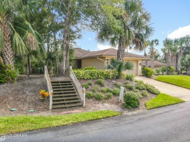 Experience carefree living in this stunning one-level residence on Sugar Mill Country Club in Florida - for sale on GolfHomes.com, golf home, golf lot